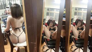 Sexy short-haired girl masturbates and squirts in front of the mirror